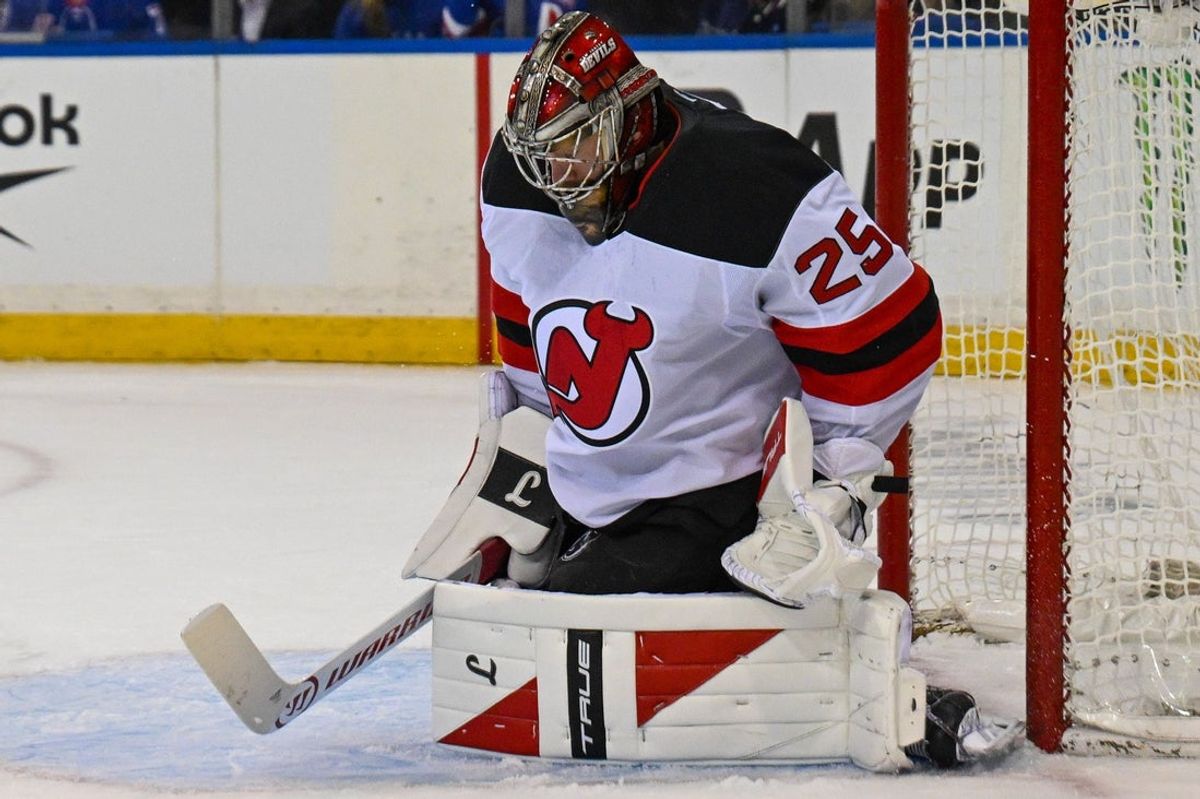 Oct 2, 2025; New York, New York, USA;  New Jersey Devils goaltender Jacob Markstrom (25) makes a save against the New York Rangers during the second period at Madison Square Garden. Mandatory Credit: Dennis Schneidler-Imagn Images