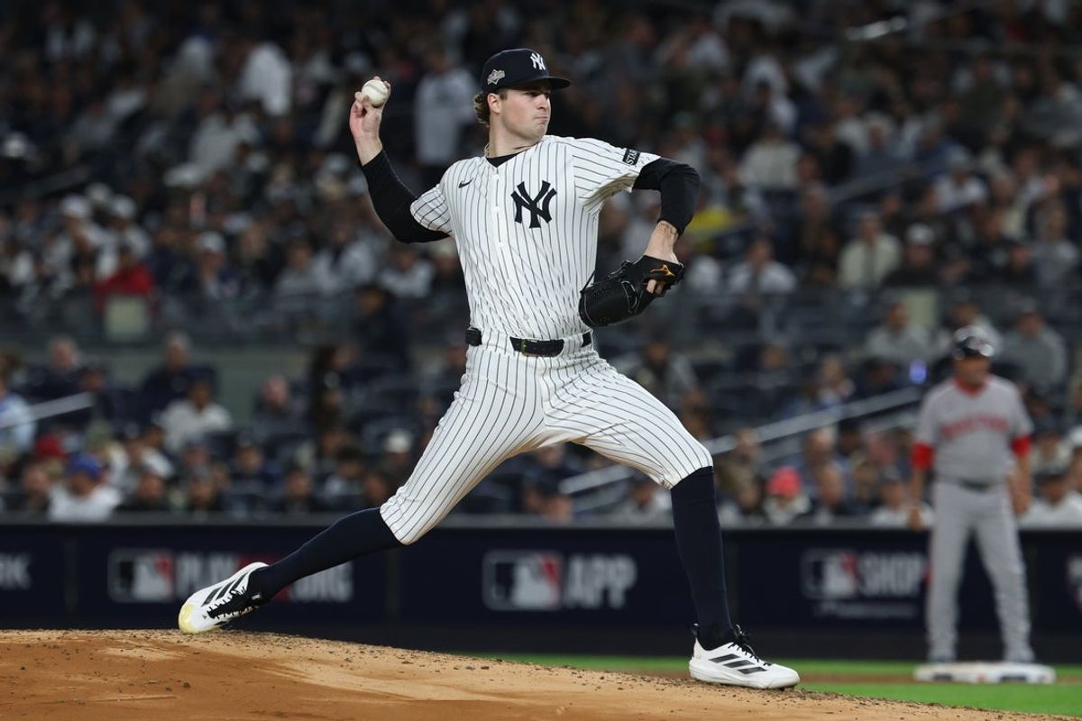 Oct 2, 2025; Bronx, New York, USA; New York Yankees starting pitcher Cam Schlittler (31) throws to the plate in the third inning against the Boston Red Sox during game three of the Wildcard round for the 2025 MLB playoffs at Yankee Stadium. Mandatory Credit: Vincent Carchietta-Imagn Images