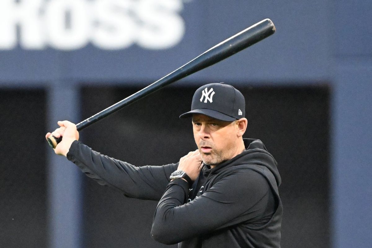Oct 3, 2025; Toronto, Ontario, Canada; New York Yankees manager Aaron Boone (17) watches his players during workouts at Rogers Centre. Mandatory Credit: Dan Hamilton-Imagn Images