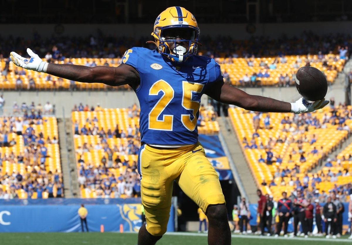 Oct 4, 2025; Pittsburgh, Pennsylvania, USA;  Pittsburgh Panthers running back Ja'Kyrian Turner (25) reacts in the end zone after scoring a touchdown against the Boston College Eagles during the second quarter at Acrisure Stadium. Mandatory Credit: Charles LeClaire-Imagn Images