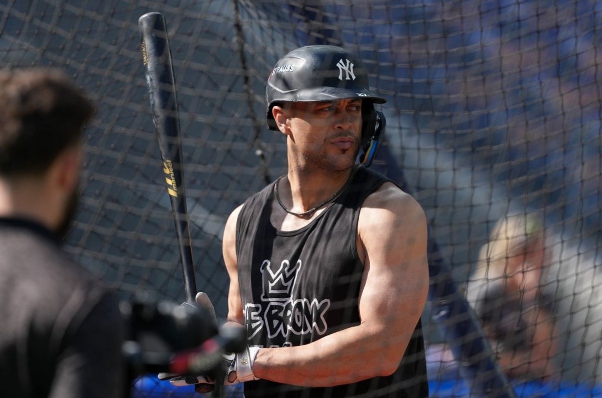 Oct 4, 2025; Toronto, Ontario, CAN; New York Yankees designated hitter Giancarlo Stanton (27) takes batting practice before game one against the Toronto Blue Jays in the ALDS round for the 2025 MLB playoffs at Rogers Centre. Mandatory Credit: Nick Turchiaro-Imagn Images