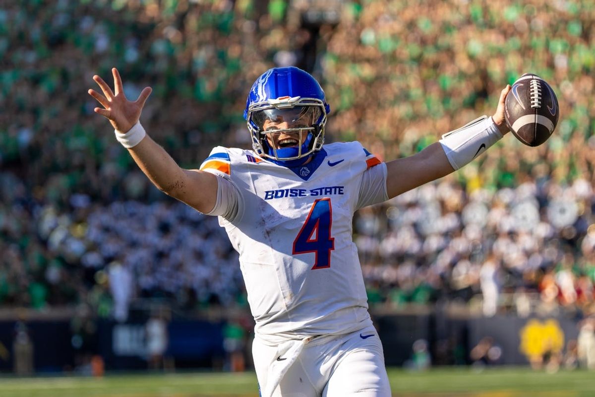Oct 4, 2025; South Bend, Indiana, USA; Boise State Broncos quarterback Maddux Madsen (4) celebrates as he runs in a touchdown against the Notre Dame Fighting Irish during the first half at Notre Dame Stadium. Mandatory Credit: Michael Caterina-Imagn Images