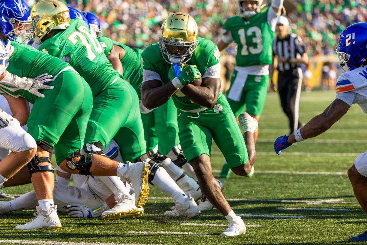 Oct 4, 2025; South Bend, Indiana, USA; Notre Dame Fighting Irish running back Jeremiyah Love (4) scores a touchdown against the Boise State Broncos during the first half at Notre Dame Stadium. Mandatory Credit: Michael Caterina-Imagn Images