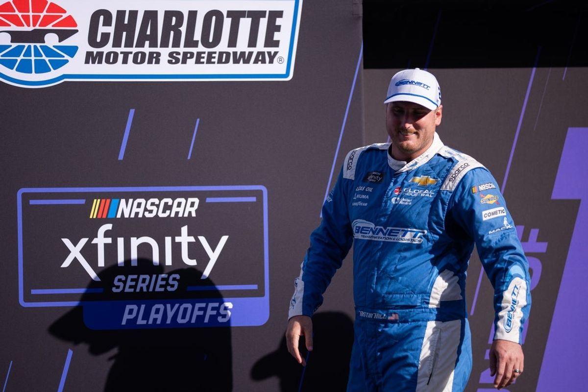 Oct 4, 2025; Concord, North Carolina, USA; NASCAR Xfinity Series driver Austin Hill (21) is introduced at Charlotte Motor Speedway Road Course. Mandatory Credit: Scott Kinser-Imagn Images