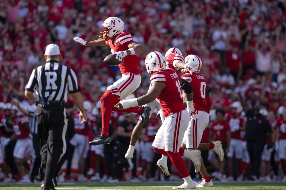 Oct 4, 2025; Lincoln, Nebraska, USA; Nebraska Cornhuskers defensive back DeShon Singleton (8) celebrates after making an interception during the game against Michigan State at Memorial Stadium. Mandatory Credit: Kylie Graham-Imagn Images