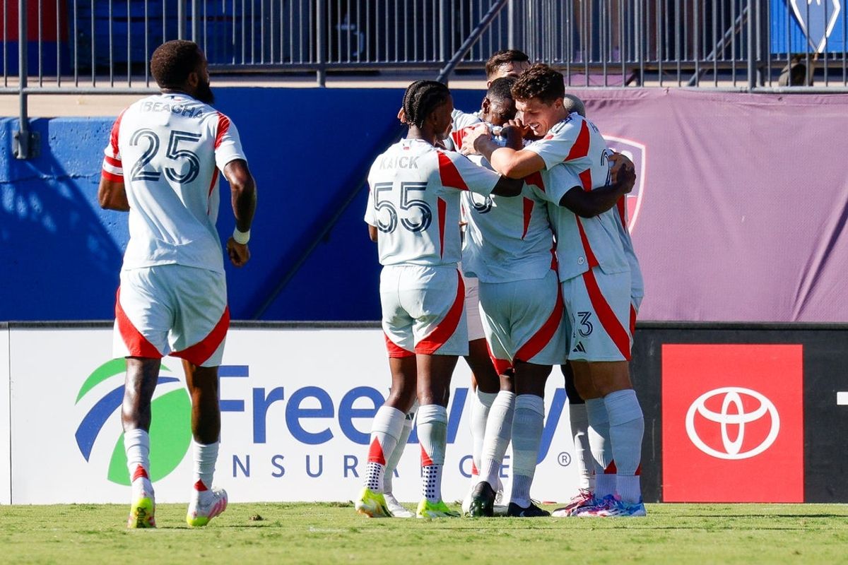 Oct 4, 2025; Frisco, Texas, USA; FC Dallas forward Logan Farrington (23) celebrates with his teammates after scoring late in the first half against the LA Galaxy at Toyota Stadium. Mandatory Credit: Andrew Dieb-Imagn Images