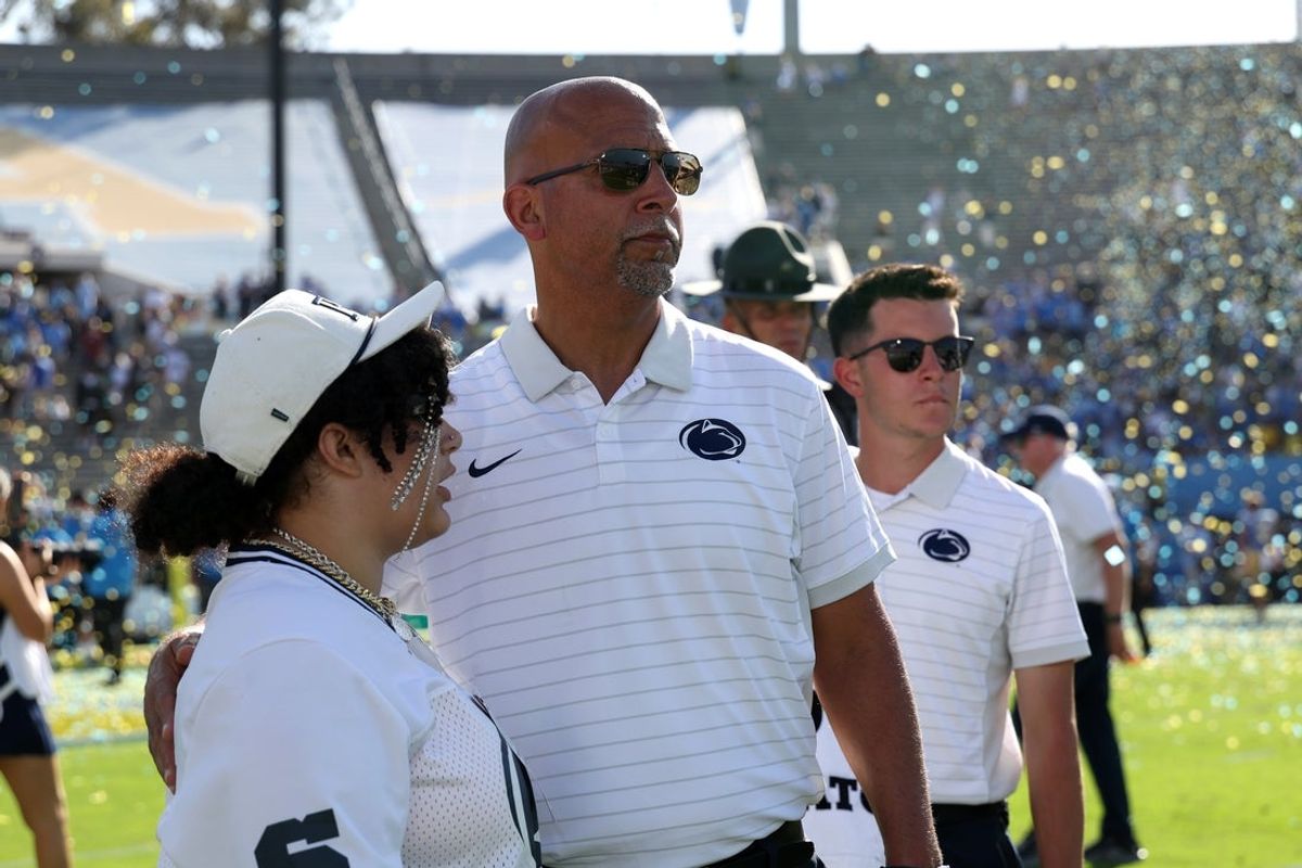 Oct 4, 2025; Pasadena, California, USA;  Penn State Nittany Lions head coach James Franklin (middle) looks on after defeated by UCLA Bruins 42-37 at Rose Bowl. Mandatory Credit: Kiyoshi Mio-Imagn Images