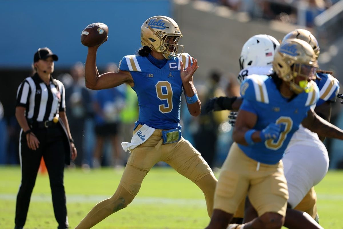 Oct 4, 2025; Pasadena, California, USA;  UCLA Bruins quarterback Nico Iamaleava (9) passes the ball during the fourth quarter against the Penn State Nittany Lions at Rose Bowl. Mandatory Credit: Kiyoshi Mio-Imagn Images