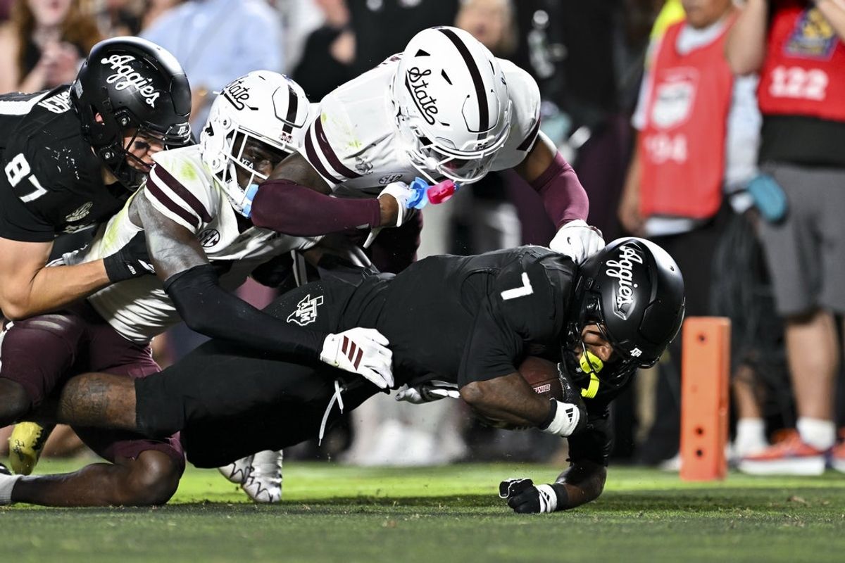 Oct 4, 2025; College Station, Texas, USA; Texas A&M Aggies wide receiver KC Concepcion (7) runs the ball in for a touchdown during the second half against the Mississippi State Bulldogs at Kyle Field. Mandatory Credit: Maria Lysaker-Imagn Images