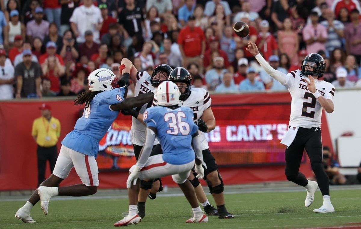 Oct 4, 2025; Houston, Texas, USA; Texas Tech Red Raiders quarterback Behren Morton (2) completes a pass against the Houston Cougars in the first half at TDECU Stadium. Mandatory Credit: Thomas Shea-Imagn Images