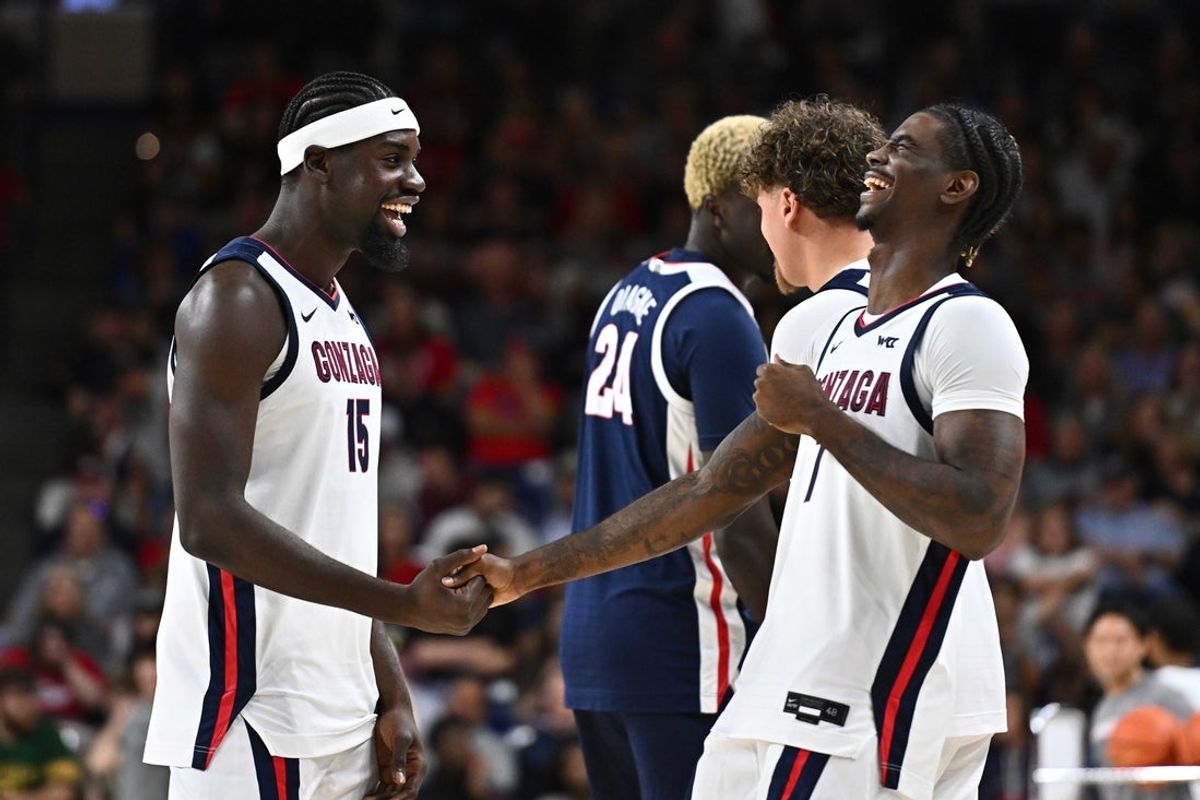 Oct 4, 2025; Spokane, WA, USA; Gonzaga Bulldogs forward Graham Ike (15) high fives Gonzaga Bulldogs Tyon Grant-Foster (7) during Numerica Kraziness in the Kennel. Mandatory Credit: James Snook-Imagn Images