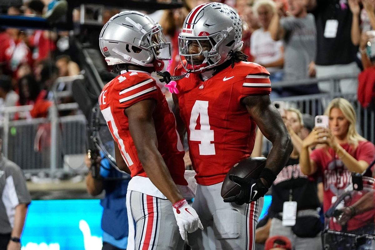Ohio State Buckeyes wide receiver Carnell Tate (17) celebrates a touchdown by wide receiver Jeremiah Smith (4) during the first half of the NCAA football game against the Minnesota Golden Gophers at Ohio Stadium in Columbus on Oct. 4, 2025.