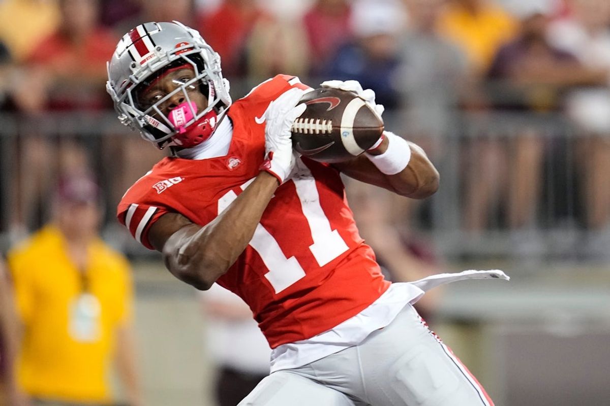 Ohio State Buckeyes wide receiver Carnell Tate (17) catches a touchdown pass during the first half of the NCAA football game against the Minnesota Golden Gophers at Ohio Stadium in Columbus on Oct. 4, 2025.