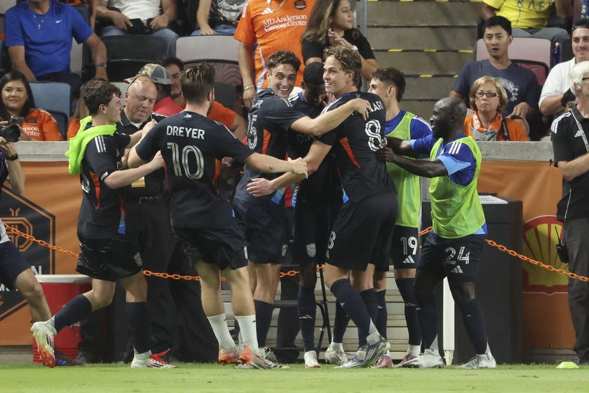 Oct 4, 2025; Houston, Texas, USA; San Diego FC midfielder Anders Dreyer (10) celebrates with teammates after a goal during stoppage time in the second half against the Houston Dynamo FC at Shell Energy Stadium. Mandatory Credit: Troy Taormina-Imagn Images
