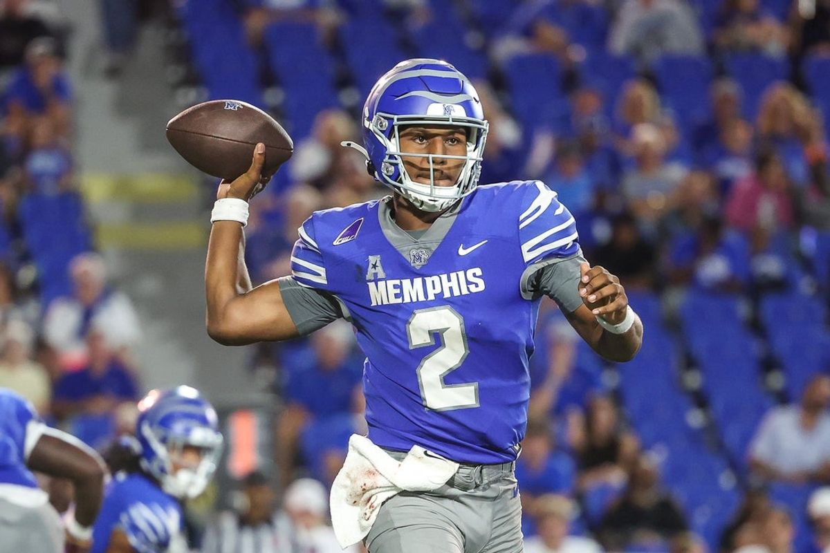 Oct 4, 2025; Memphis, Tennessee, USA; Memphis Tigers quarterback Brendon Lewis (2) looks to pass the ball against the Tulsa Golden Hurricane during the second half at Simmons Bank Liberty Stadium. Mandatory Credit: Wesley Hale-Imagn Images