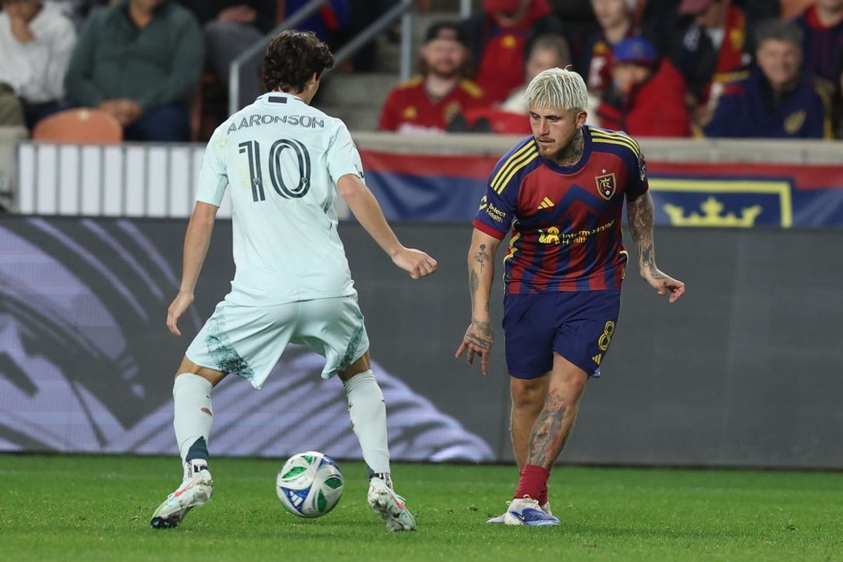 Oct 4, 2025; Sandy, Utah, USA; Real Salt Lake midfielder Diego Luna (8) passes the ball against Colorado Rapids midfielder Paxten Aaronson (10) during the second half at America First Field. Mandatory Credit: Rob Gray-Imagn Images