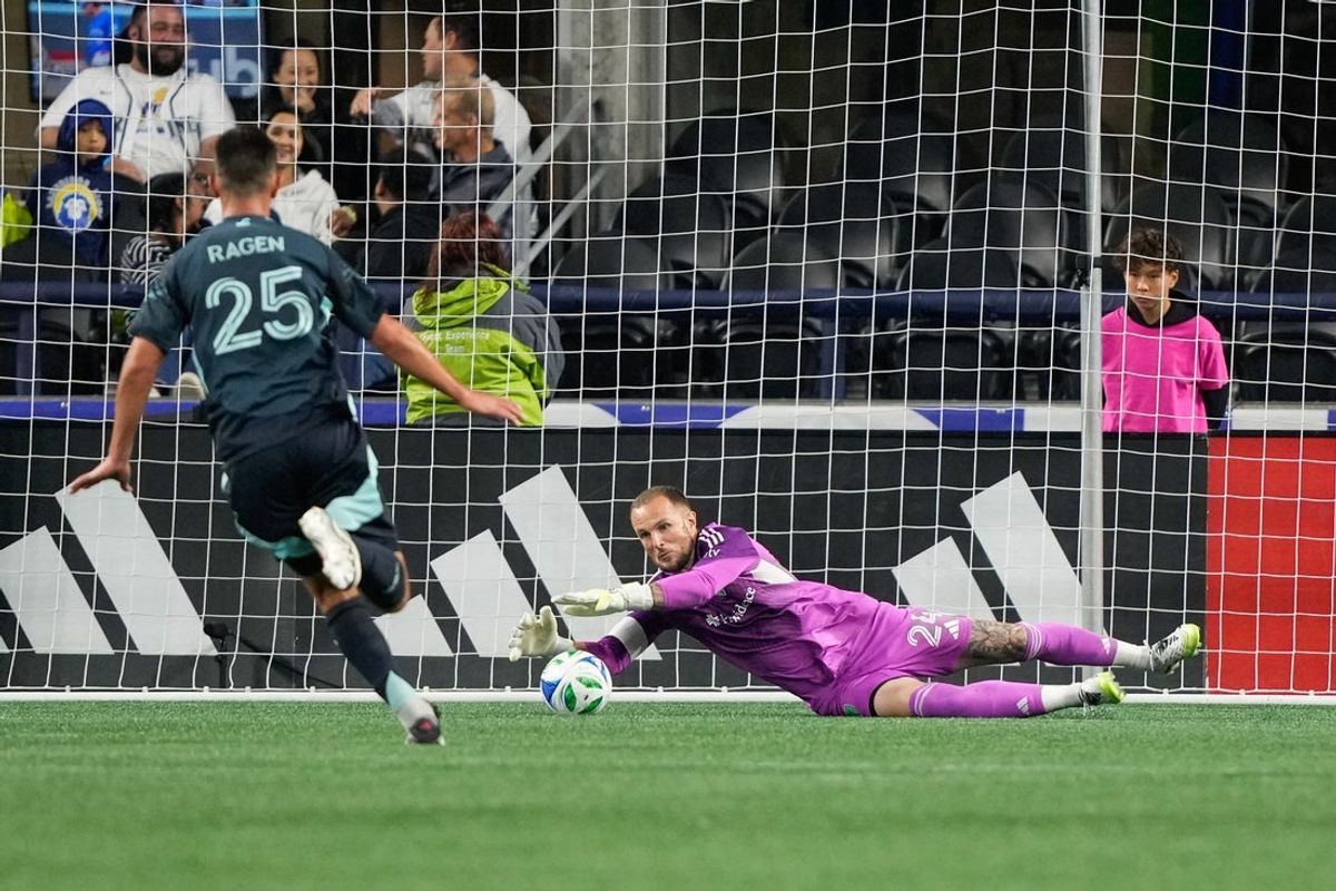 Oct 4, 2025; Seattle, Washington, USA; Seattle Sounders FC goalkeeper Stefan Frei (24) makes a save in the second half against the Portland Timbers at Lumen Field. Mandatory Credit: Stephen Brashear-Imagn Images