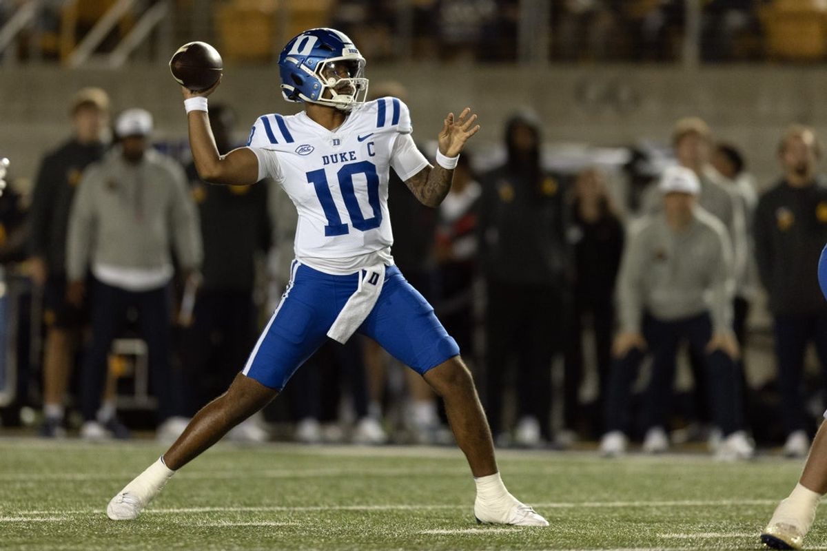 Oct 4, 2025; Berkeley, California, USA; Duke Blue Devils quarterback Darian Mensah (10) throws a pass against the California Golden Bears during the second quarter at California Memorial Stadium. Mandatory Credit: D. Ross Cameron-Imagn Images
