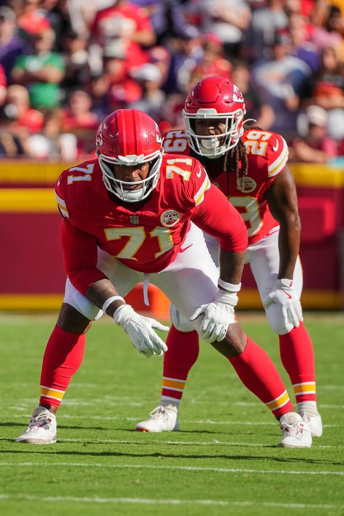 Sep 28, 2025; Kansas City, Missouri, USA; Kansas City Chiefs offensive tackle Josh Simmons (71) and running back Kareem Hunt (29) line up against the Baltimore Ravens during the game at GEHA Field at Arrowhead Stadium. Mandatory Credit: Denny Medley-Imagn Images