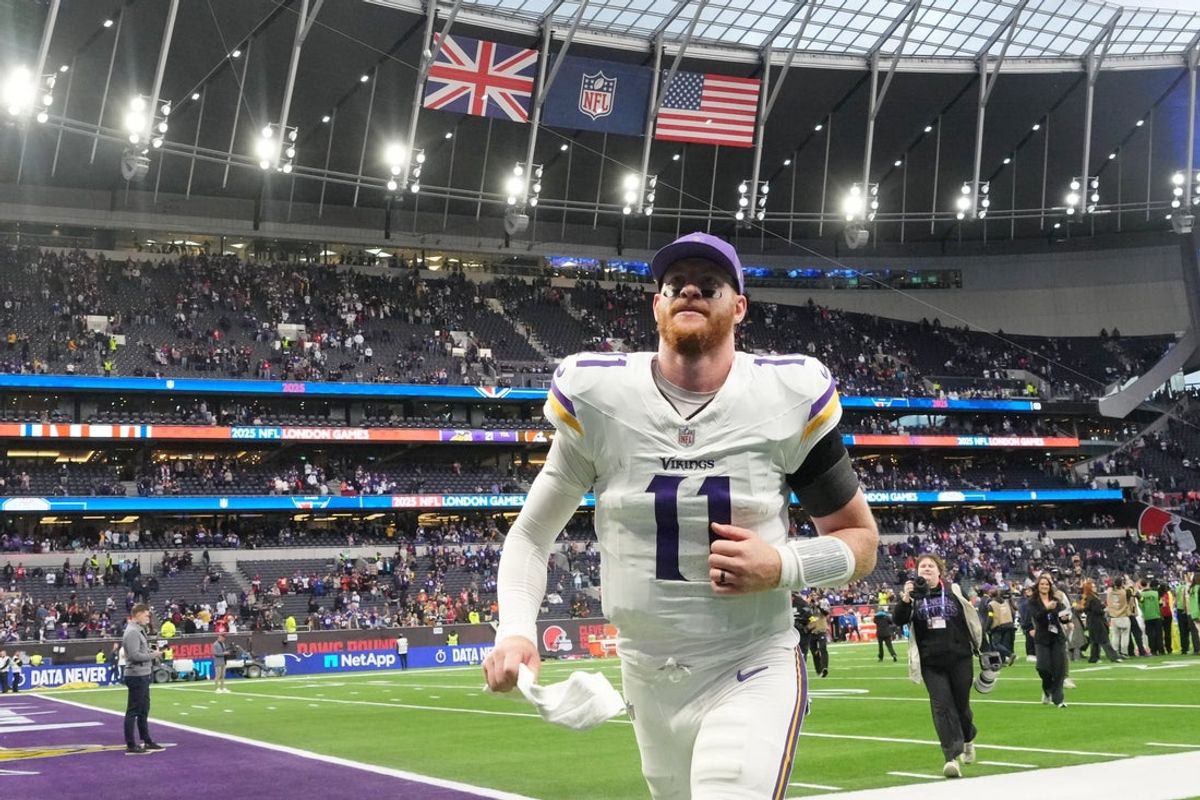 Oct 5, 2025; Tottenham, United Kingdom; Minnesota Vikings quarterback Carson Wentz (11) walks off the field after their win against the Cleveland Browns in an NFL International Series game at Tottenham Hotspur Stadium. Mandatory Credit: Kirby Lee-Imagn Images