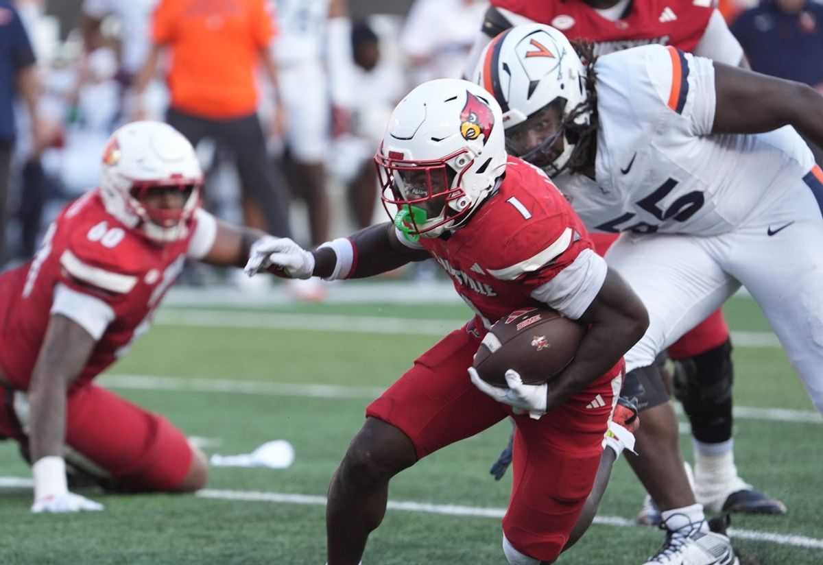 Louisville’s Isaac Brown runs the ball against Virginia at L&N Stadium Saturday.
Oct. 4, 2025