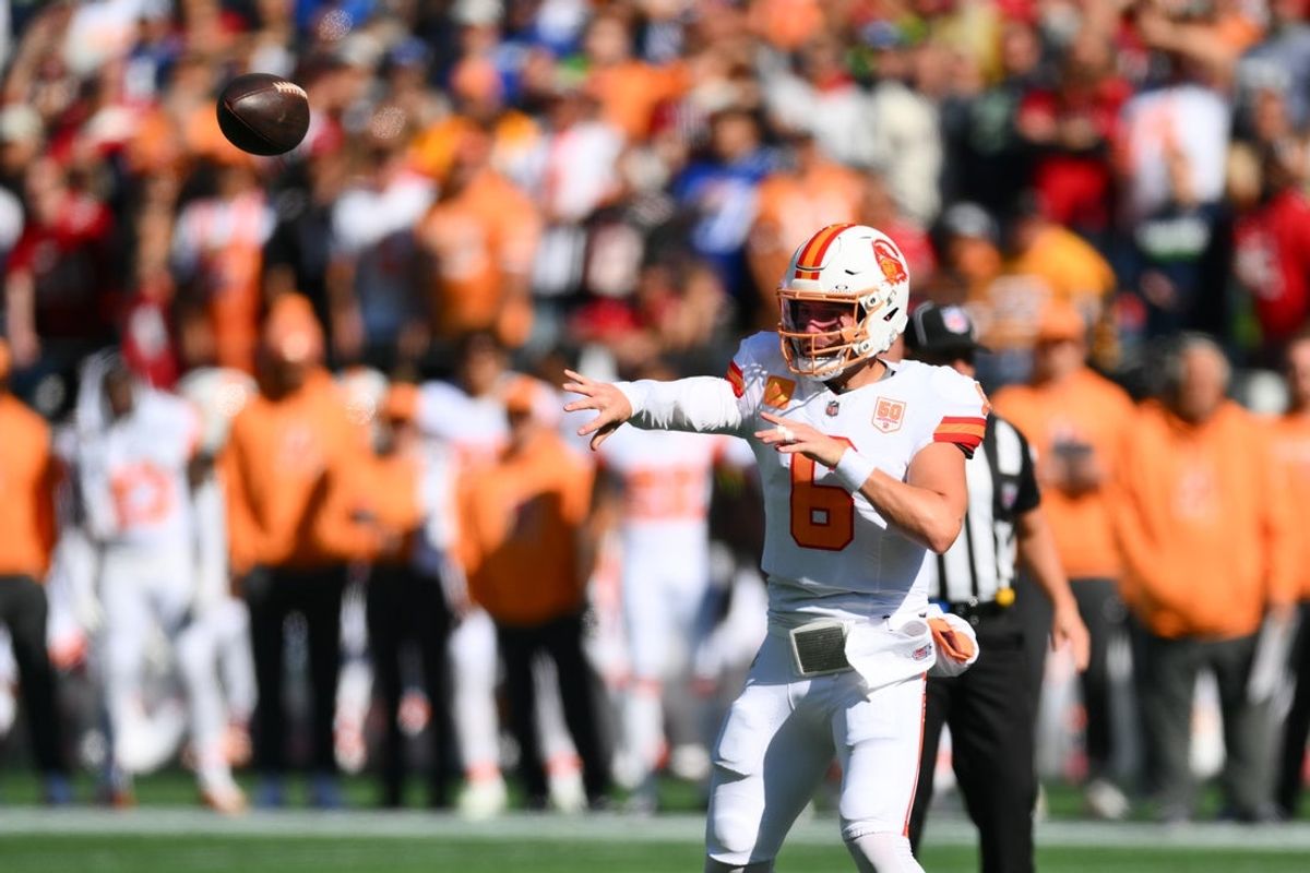 Oct 5, 2025; Seattle, Washington, USA; Tampa Bay Buccaneers quarterback Baker Mayfield (6) throws a pass against the Seattle Seahawks during the first half at Lumen Field. Mandatory Credit: Steven Bisig-Imagn Images