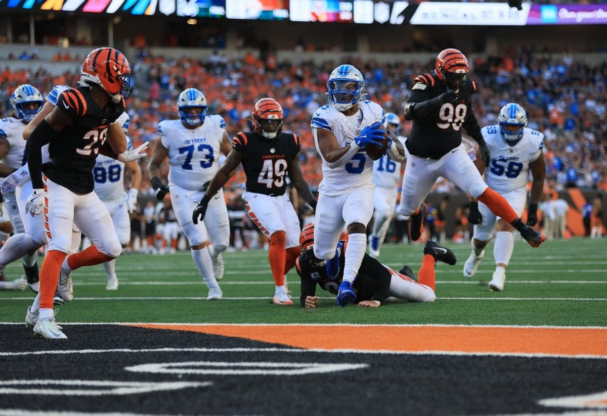 Oct 5, 2025; Cincinnati, Ohio, USA; Detroit Lions running back David Montgomery (5) runs for a touchdown during the third quarter against the Cincinnati Bengals at Paycor Stadium. Mandatory Credit: Katie Stratman-Imagn Images