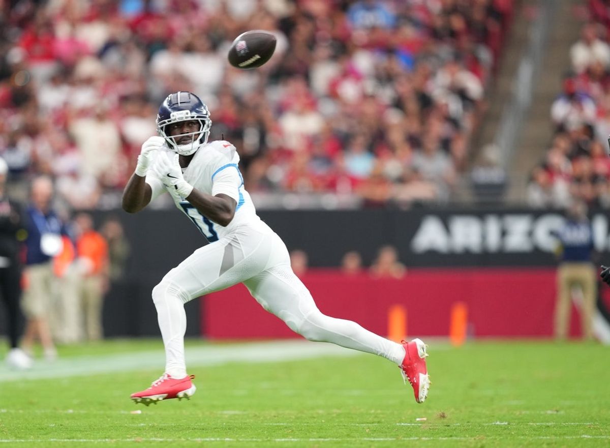 Oct 5, 2025; Glendale, Arizona, USA; Tennessee Titans wide receiver Calvin Ridley (0) makes a catch against the Arizona Cardinals during the second quarter at State Farm Stadium. Mandatory Credit: Joe Camporeale-Imagn Images