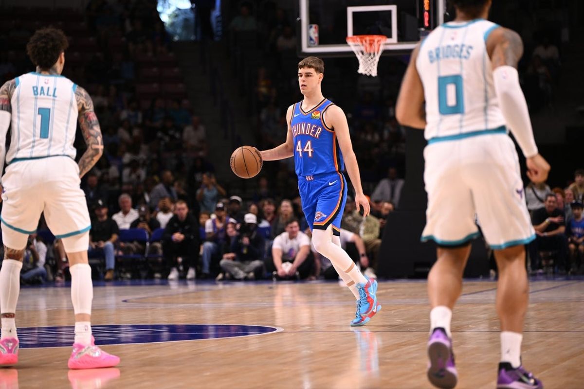 Oct 5, 2025; North Charleston, South Carolina, USA; Oklahoma City Thunder guard Nikola Topic (44) drives up the court against the Charlotte Hornets at North Charleston Coliseum. Mandatory Credit: Arthur Ellis-Imagn Images