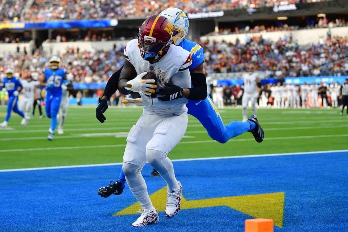 Oct 5, 2025; Inglewood, California, USA; Washington Commanders wide receiver Deebo Samuel Sr. (1) makes a catch for a touchdown against the Los Angeles Chargers in the second half at SoFi Stadium. Mandatory Credit: Gary A. Vasquez-Imagn Images