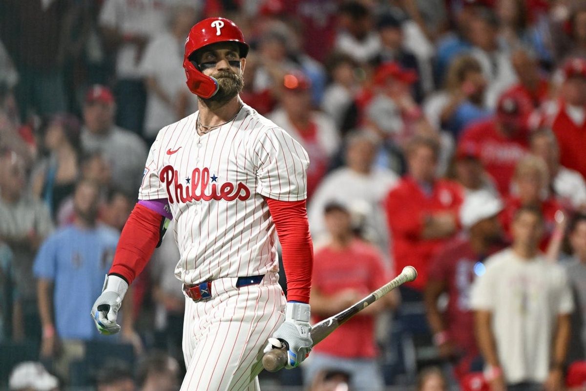 Oct 6, 2025; Philadelphia, Pennsylvania, USA; Philadelphia Phillies first baseman Bryce Harper (3) reacts to striking out against the Los Angeles Dodgers in the sixth inning during game two of the NLDS round for the 2025 MLB playoffs at Citizens Bank Park. Mandatory Credit: Eric Hartline-Imagn Images