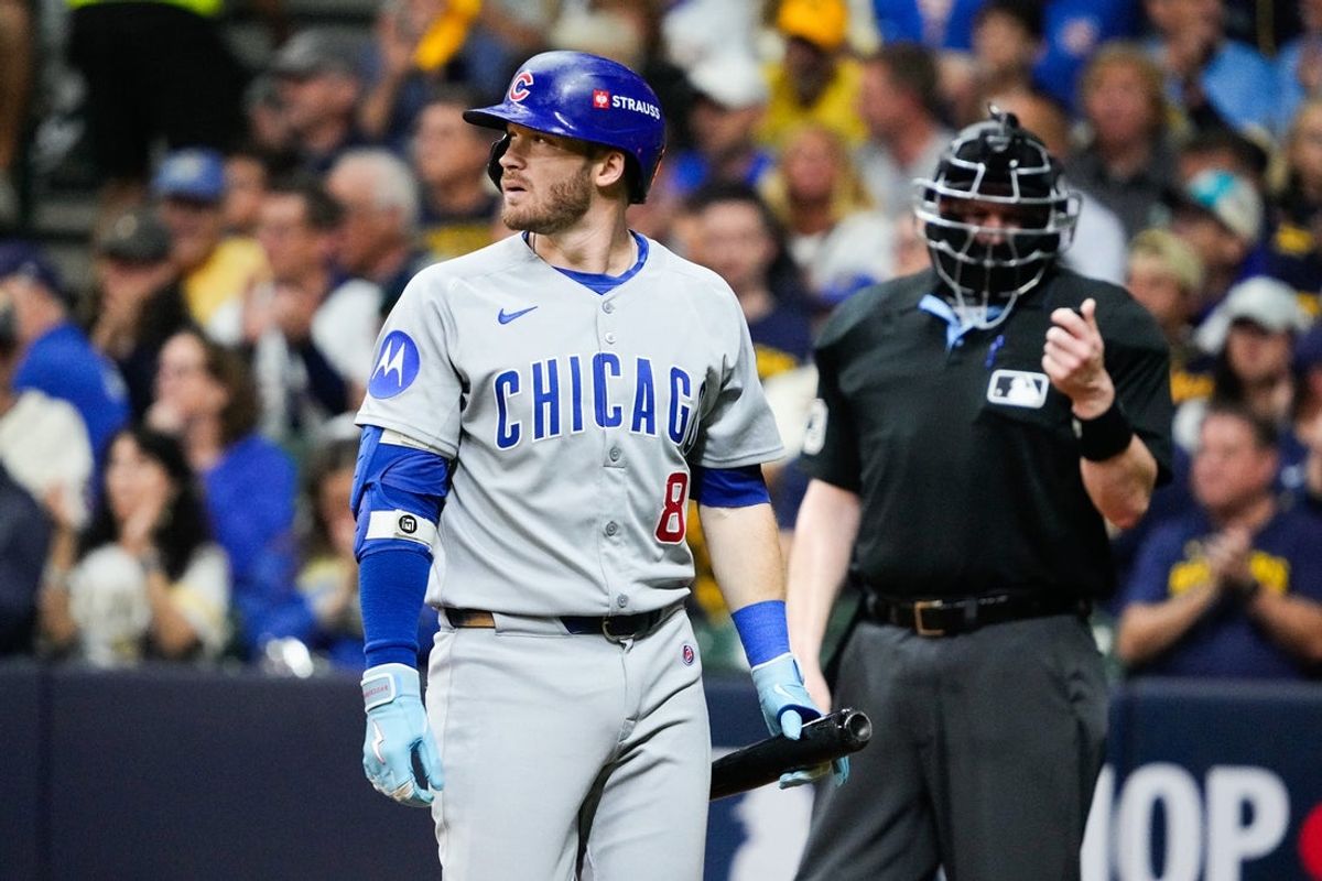 Oct 6, 2025; Milwaukee, Wisconsin, USA; Chicago Cubs left fielder Ian Happ (8) looks on after striking out during the third inning against the Milwaukee Brewers during game two of the NLDS round for the 2025 MLB playoffs at American Family Field. Mandatory Credit: Michael McLoone-Imagn Images