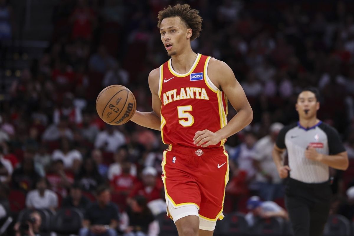 Oct 6, 2025; Houston, Texas, USA; Atlanta Hawks guard Dyson Daniels (5) dribbles the ball during the third quarter against the Houston Rockets at Toyota Center. Mandatory Credit: Troy Taormina-Imagn Images