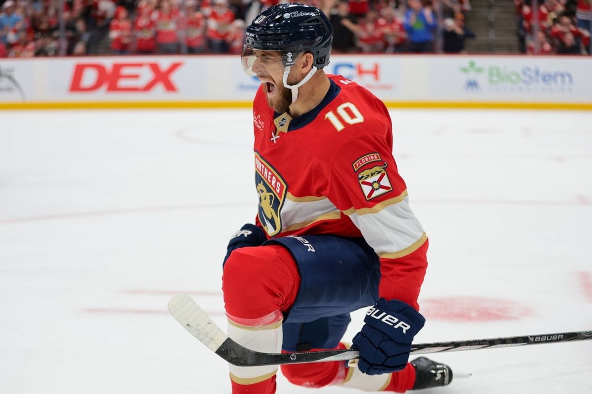 Oct 7, 2025; Sunrise, Florida, USA; Florida Panthers left wing A.J. Greer (10) celebrates after scoring against the Chicago Blackhawks during the first period at Amerant Bank Arena. Mandatory Credit: Sam Navarro-Imagn Images