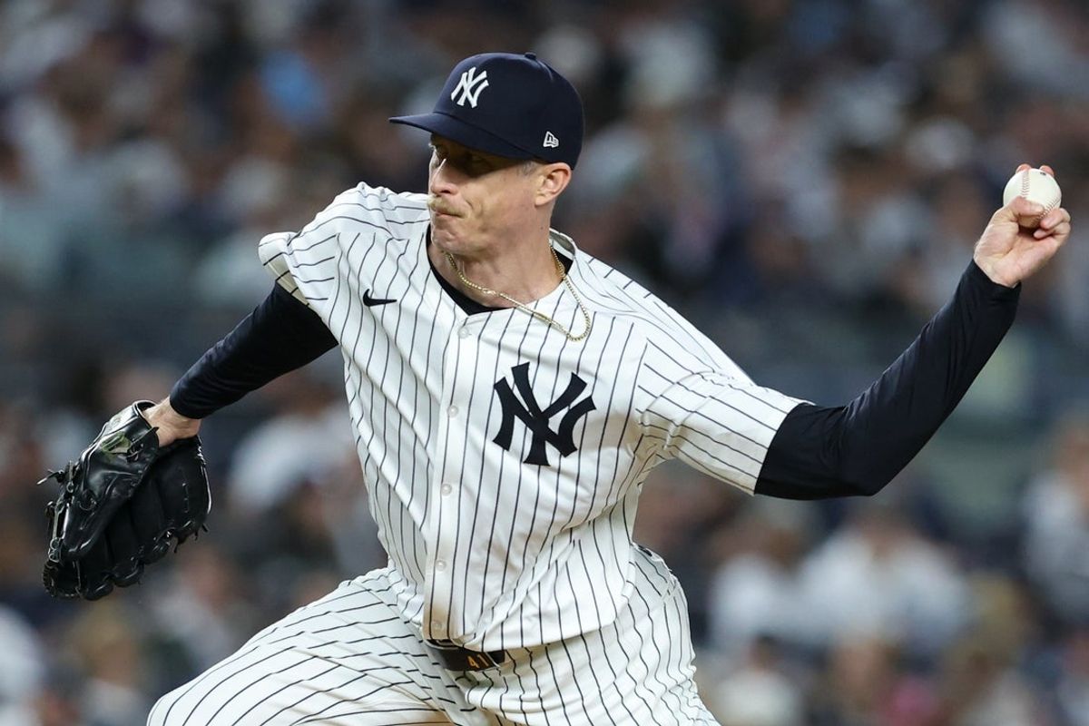 Oct 7, 2025; Bronx, New York, USA; New York Yankees relief pitcher Tim Hill (41) delivers a pitch in the fifth inning against the Toronto Blue Jays during game three of the ALDS round for the 2025 MLB playoffs at Yankee Stadium. Mandatory Credit: Wendell Cruz-Imagn Images