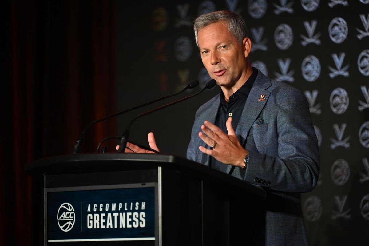 Oct 8, 2025; Charlotte, NC, USA; Virginia head coach Ryan Odom answers questions from the media at The Hilton Charlotte Uptown. Mandatory Credit: William Howard-Imagn Images