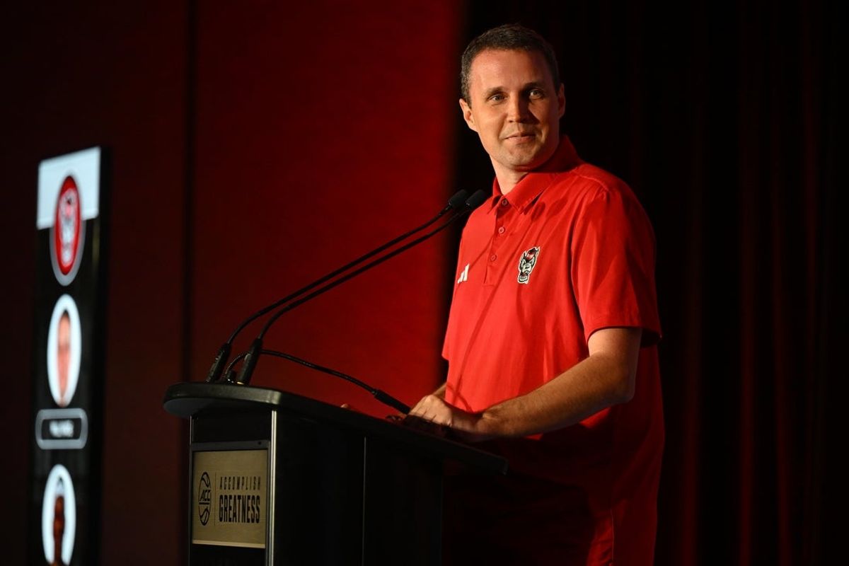 Oct 8, 2025; Charlotte, NC, USA; NC State head coach Will Wade answers questions from the media at The Hilton Charlotte Uptown. Mandatory Credit: William Howard-Imagn Images