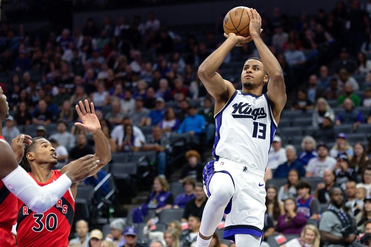 Oct 8, 2025; Sacramento, California, USA; Sacramento Kings forward Keegan Murray (13) shoots the ball during the first quarter against the Toronto Raptors at Golden 1 Center. Mandatory Credit: Sergio Estrada-Imagn Images