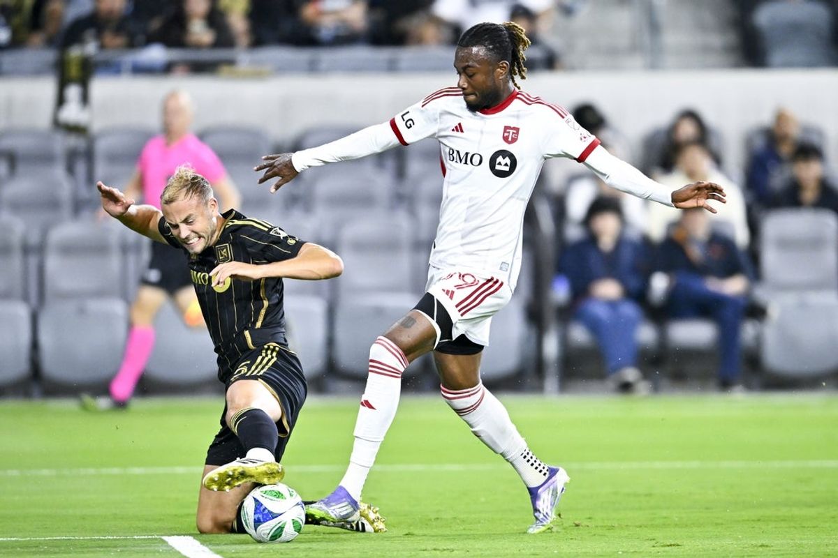 Oct 8, 2025; Los Angeles, California, USA; Los Angeles FC midfielder Igor Jesus (6) defends against Los Angeles FC forward Denis Bouanga (99) during the first half at BMO Stadium. Mandatory Credit: Kelvin Kuo-Imagn Images