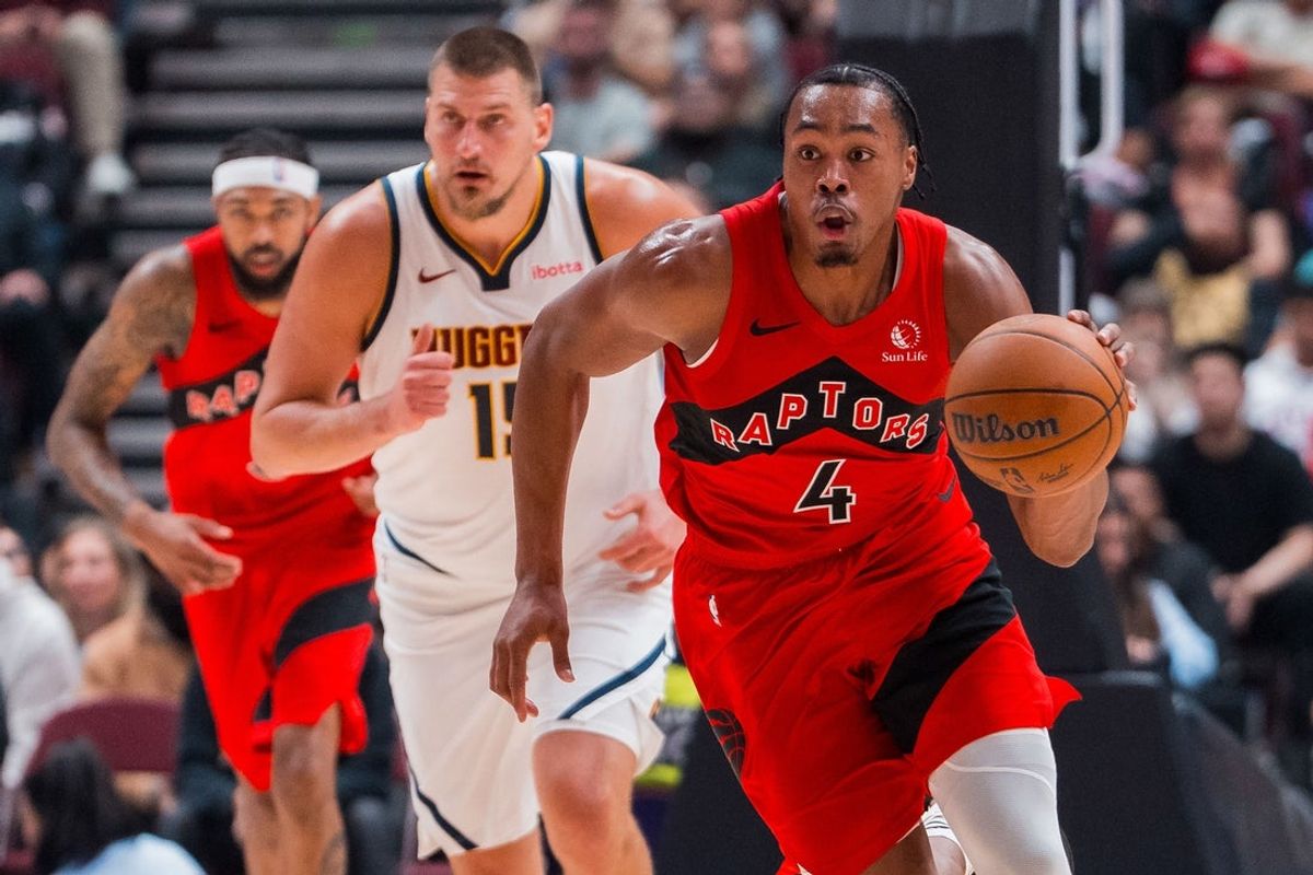 Oct 6, 2025; Vancouver, British Columbia, CAN; Toronto Raptors guard Scottie Barnes (4) drives with the ball against the Denver Nuggets in the first half at Rogers Arena. Mandatory Credit: Bob Frid-Imagn Images
