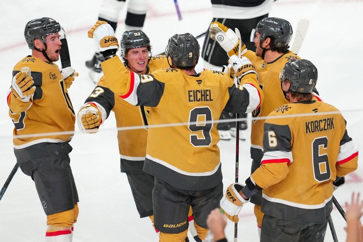 Oct 8, 2025; Las Vegas, Nevada, USA; Vegas Golden Knights right wing Mitch Marner (93) celebrates with Vegas Golden Knights center Jack Eichel (9), after assisting on a goal scored by Eichel against the Los Angeles Kings during the third period at T-Mobile Arena. Mandatory Credit: Stephen R. Sylvanie-Imagn Images