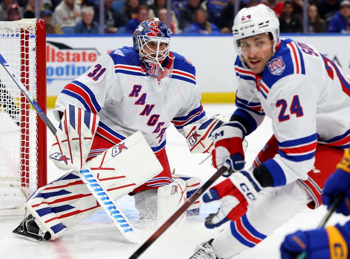 Oct 9, 2025; Buffalo, New York, USA;  New York Rangers goaltender Igor Shesterkin (31) looks for the puck during the first period against the Buffalo Sabres at KeyBank Center. Mandatory Credit: Timothy T. Ludwig-Imagn Images