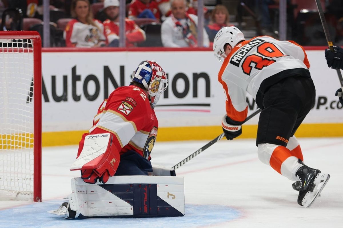 Oct 9, 2025; Sunrise, Florida, USA; Florida Panthers goaltender Sergei Bobrovsky (72) makes a save against Philadelphia Flyers right wing Matvei Michkov (39) during the first period at Amerant Bank Arena. Mandatory Credit: Sam Navarro-Imagn Images