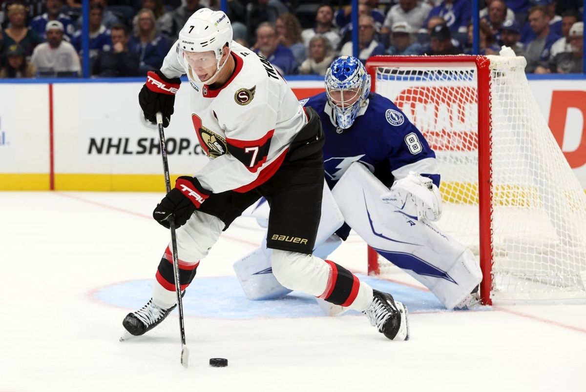 Oct 9, 2025; Tampa, Florida, USA; Ottawa Senators left wing Brady Tkachuk (7) skates with the puck in front of Tampa Bay Lightning goaltender Andrei Vasilevskiy (88) during the second period at Benchmark International Arena. Mandatory Credit: Kim Klement Neitzel-Imagn Images