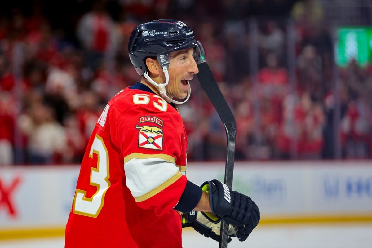 Oct 9, 2025; Sunrise, Florida, USA;  Florida Panthers left wing Brad Marchand (63) celebrates after scoring against the Philadelphia Flyers during the third period at Amerant Bank Arena. Mandatory Credit: Sam Navarro-Imagn Images