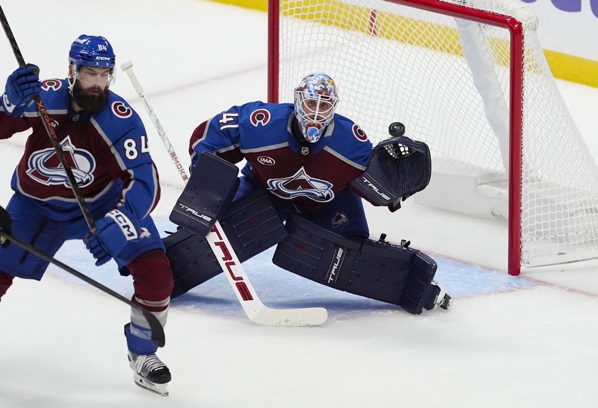 Oct 9, 2025; Denver, Colorado, USA; Colorado Avalanche goaltender Scott Wedgewood (41) prepares to make a save in the third period against the Utah Mammoth at Ball Arena. Mandatory Credit: Ron Chenoy-Imagn Images