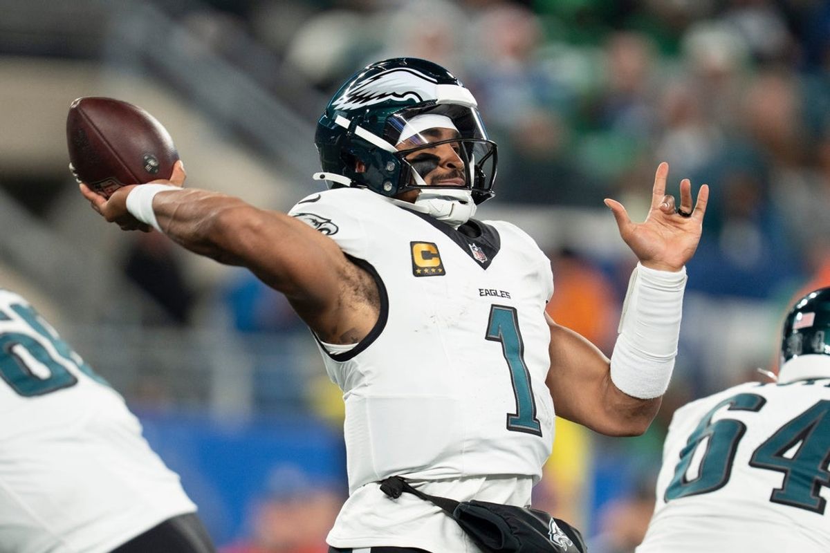 Philadelphia Eagles quarterback Jalen Hurts (1) throws a pass during a Thursday Night Football game between the New York Giants and the Philadelphia Eagles at MetLife Stadium in East Rutherford on Oct. 9, 2025.