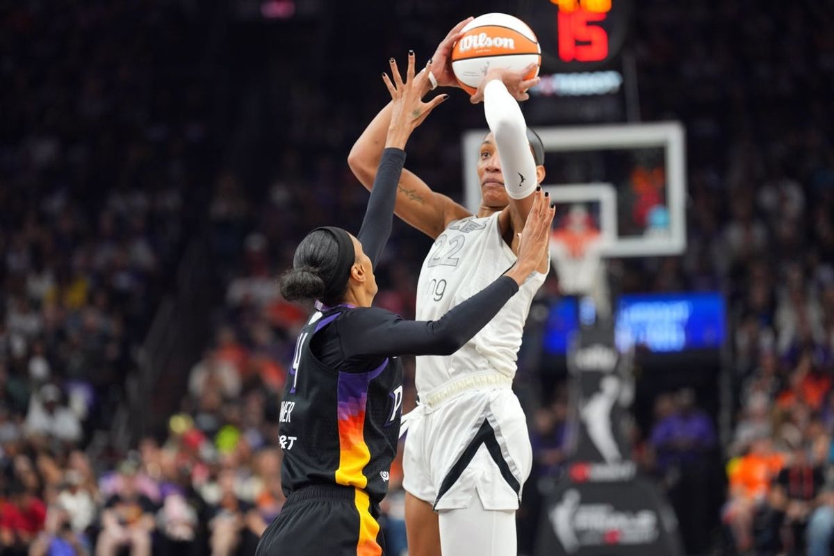 Oct 10, 2025; Phoenix, Arizona, USA; Las Vegas Aces center A'ja Wilson (22) shoots against the Phoenix Mercury during the first half of game four of the 2025 WNBA Finals at Mortgage Matchup Center. Mandatory Credit: Joe Camporeale-Imagn Images