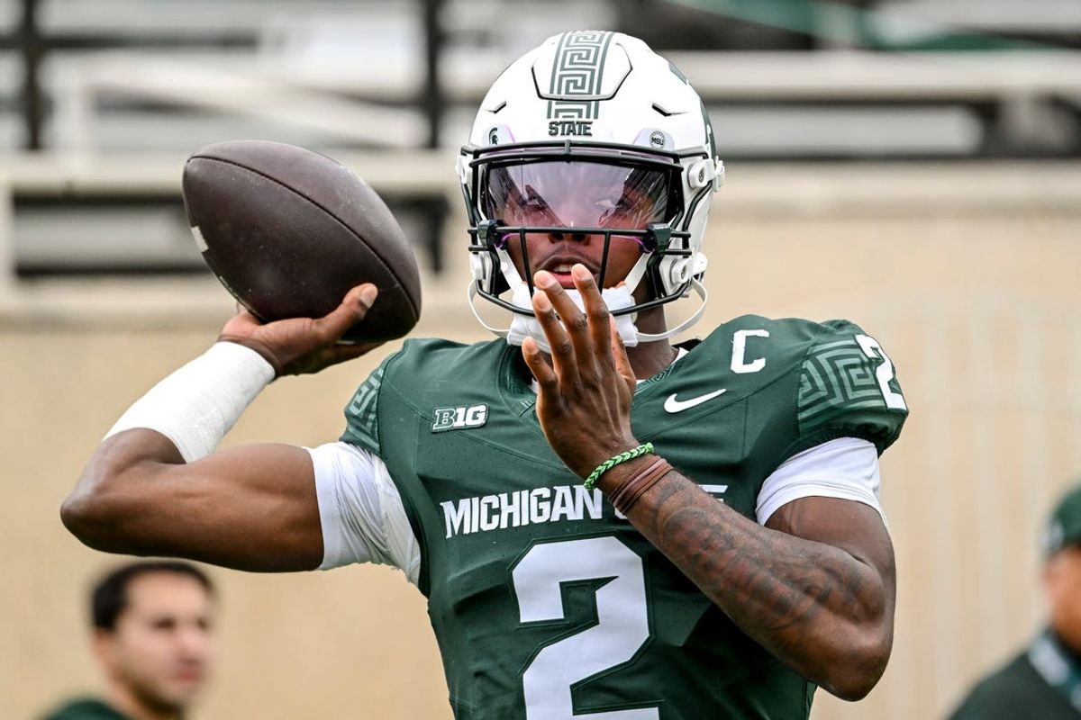 Michigan State's Aidan Chiles warms up before the football game against UCLA on Saturday, Oct. 11, 2025, at Spartan Stadium in East Lansing.