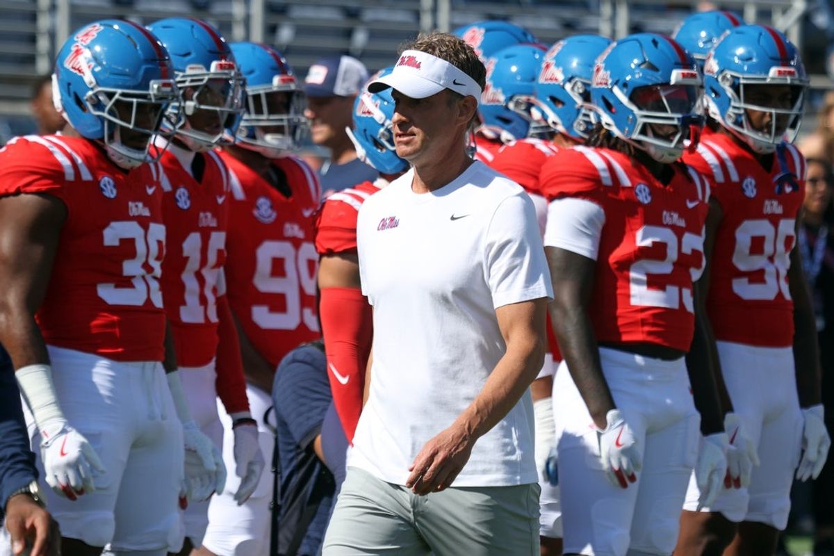 Oct 11, 2025; Oxford, Mississippi, USA; Mississippi Rebels head coach Lane Kiffin looks on during warm ups prior to the game against the Washington State Cougars at Vaught-Hemingway Stadium. Mandatory Credit: Petre Thomas-Imagn Images